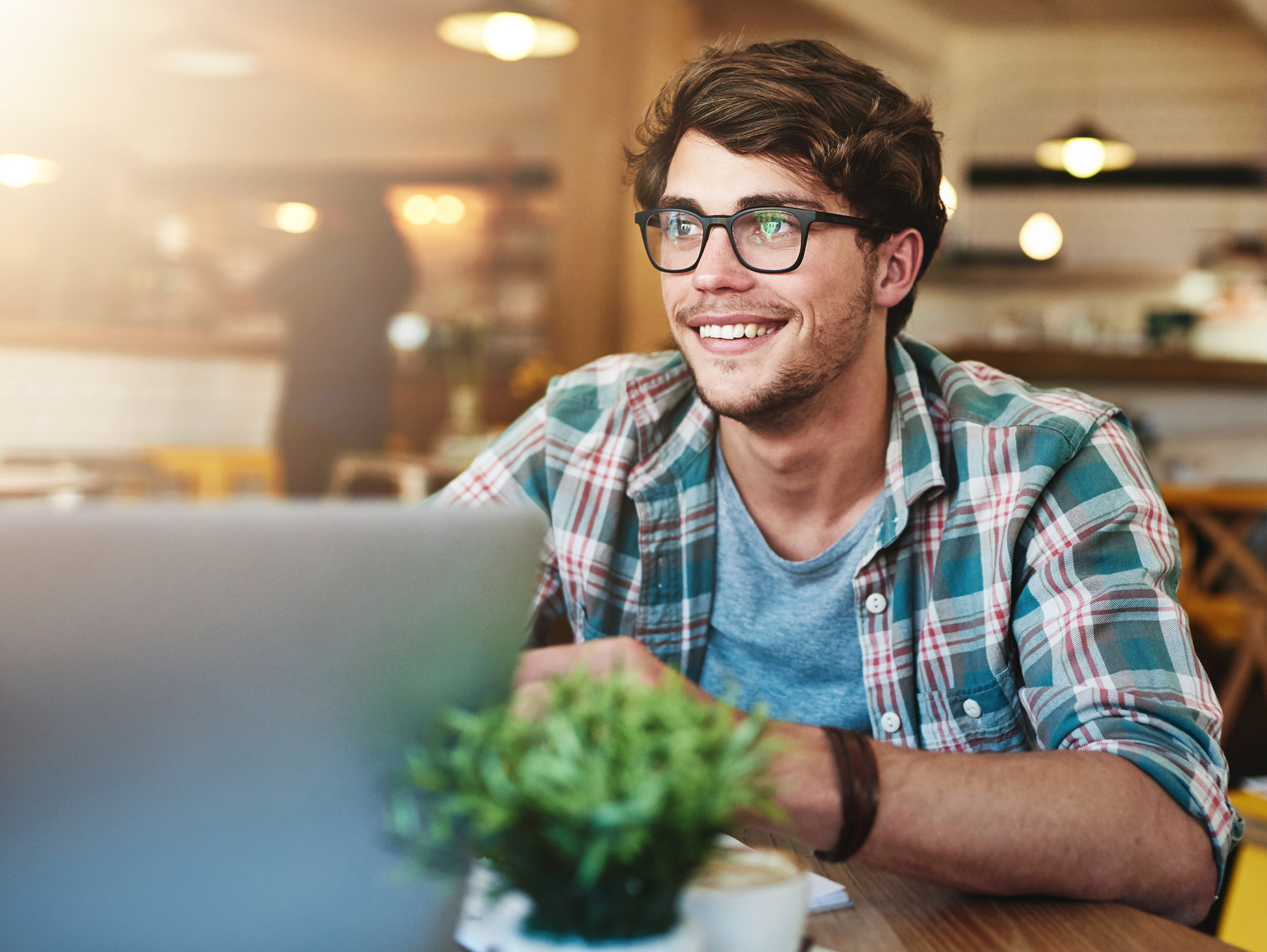 student sitting at coffee shop