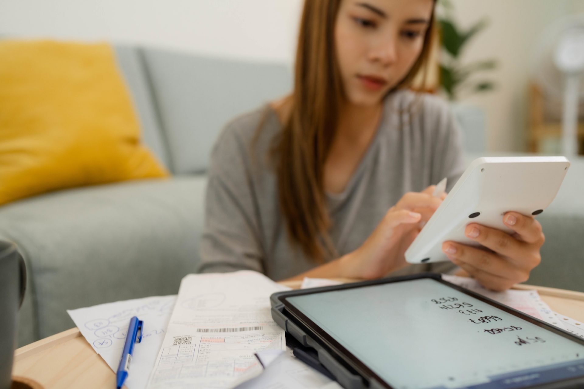 student calculating expenses